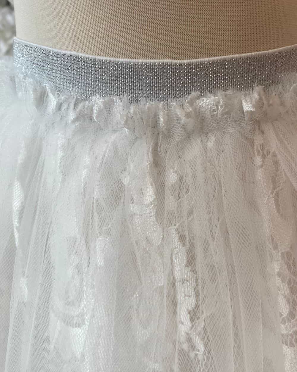 Wit ivoor tule rokje maat 128