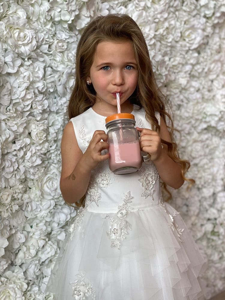 Bruidsmeisjes jurken passen kind winkel